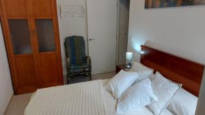 Postel nebo postele na pokoji v ubytování Típica casa sevillana en el barrio de Triana