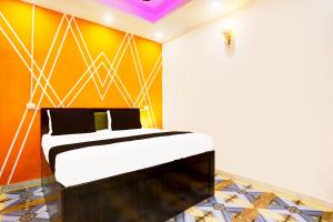 Postel nebo postele na pokoji v ubytování Hotel O Royal Stone