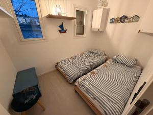 Postel nebo postele na pokoji v ubytování La Corniche