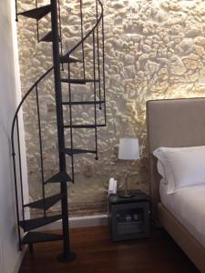A bed or beds in a room at Arcipelago 41