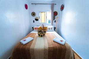 Postel nebo postele na pokoji v ubytování Mabidi Surf Taghazout