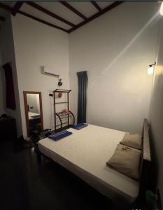 Postel nebo postele na pokoji v ubytování Pinidu Villa