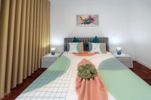 Postel nebo postele na pokoji v ubytování Sea Breeze II