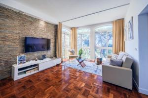 TV a/nebo společenská místnost v ubytování Sea Breeze II