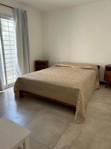 Ένα ή περισσότερα κρεβάτια σε δωμάτιο στο Sunny Days Rent