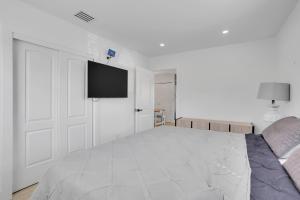 Кровать или кровати в номере Sunny Cottage 3