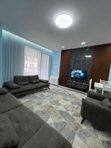 Χώρος καθιστικού στο Blu Apartamen Nearly Airoport Tirana +1 φωτογραφίες