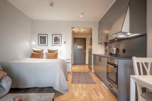 Η κουζίνα ή μικρή κουζίνα στο Uppsala Hotel Apartments