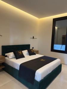 Ένα ή περισσότερα κρεβάτια σε δωμάτιο στο Mia Villa +16 φωτογραφίες