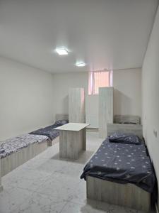 Postel nebo postele na pokoji v ubytování Resta hostel