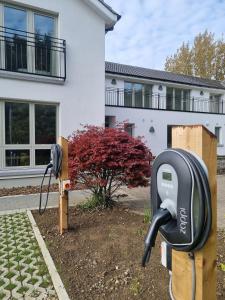 a pair of pay phones in front of a house at Sage- Glamping Pod in Malahide
