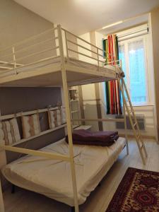 Giường trong phòng chung tại Le palas