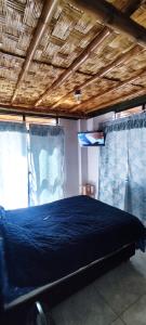 Ένα ή περισσότερα κρεβάτια σε δωμάτιο στο Casa rústica