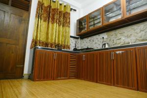 Η κουζίνα ή μικρή κουζίνα στο ARIYASIRI k VILLA