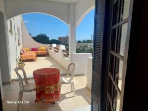 Balkón nebo terasa v ubytování chambre Noix de Coco résidence Chahrazad