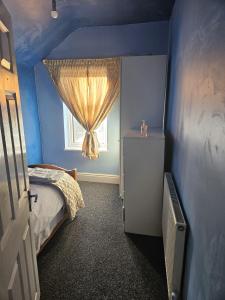 Ένα ή περισσότερα κρεβάτια σε δωμάτιο στο Serenity 5775