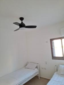 Postel nebo postele na pokoji v ubytování K Home 2