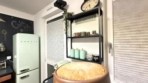 Η κουζίνα ή μικρή κουζίνα στο Accommodation at a prime location - near messe