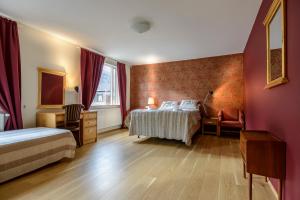 Postel nebo postele na pokoji v ubytování Hotel Latrabjarg
