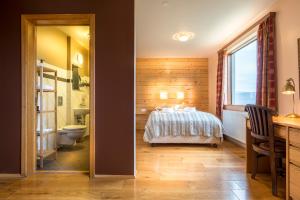 Postel nebo postele na pokoji v ubytování Hotel Latrabjarg