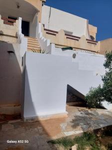 Budova, kde se ubytování v soukromí nachází + 1 fotografie