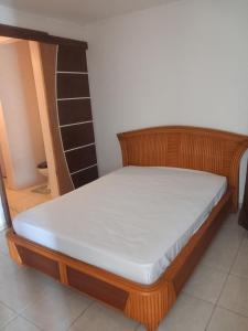 a bed in a room with a bunk bed at lorispring in Îlet à Christophe