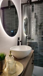 Koupelna v ubytování MoreLove II + 6 fotografií