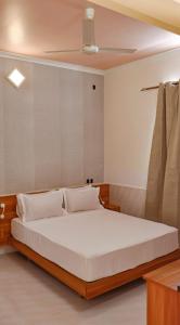 Ένα ή περισσότερα κρεβάτια σε δωμάτιο στο Lux Hotel Mathiveri