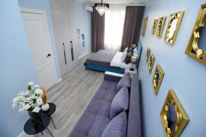 Χώρος καθιστικού στο Современный апартамент в центре Алматы, Mega Park - Arbat