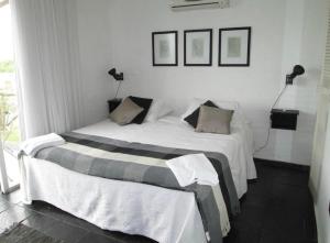 Giường trong phòng chung tại Aura Montoya