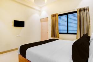 Fotografie z fotogalerie ubytování Hotel O Sai Palace v destinaci Karmād