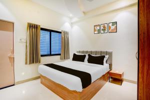 Fotografie z fotogalerie ubytování Hotel O Sai Palace v destinaci Karmād