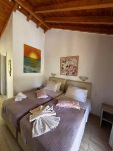 Postel nebo postele na pokoji v ubytování Voula Studio