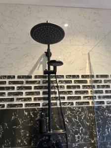 a table with a microphone and a keyboard at Elilia in Beau Vallon +13 photos