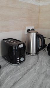 a toaster sitting on top of a counter at Elilia in Beau Vallon