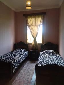 Postel nebo postele na pokoji v ubytování Motena Guesthouse