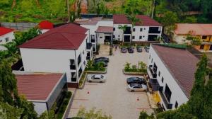 an aerial view of a parking lot with parked cars at Aurum on Missouri in Abuja +21 photos