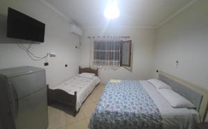 Ένα ή περισσότερα κρεβάτια σε δωμάτιο στο Grand Rooms +20 φωτογραφίες