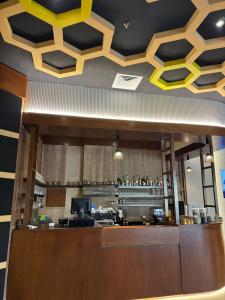 Kuchyň nebo kuchyňský kout v ubytování Acacia Hotel by BP Management