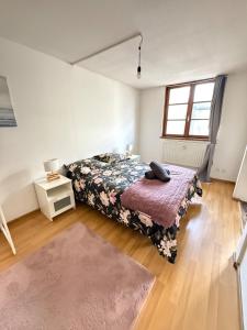 Postel nebo postele na pokoji v ubytování Charme cœur Obernai idéal marché de Noel