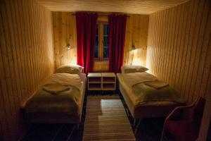 Voodi või voodid majutusasutuse Viking Cabins - MIT FabLab - Solvik toas