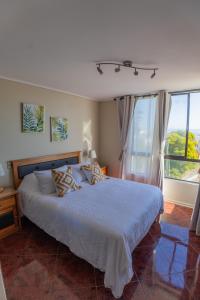 Postel nebo postele na pokoji v ubytování Reñaca en primera linea,terraza panoramica acceso directo a la playa