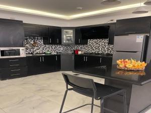 Kuchyň nebo kuchyňský kout v ubytování Aroma Chalet