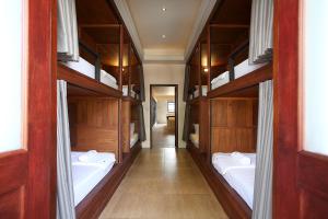 Postel nebo postele na pokoji v ubytování Hogwortz Hostel & Tour + 15 fotografií