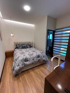 Postel nebo postele na pokoji v ubytování GZ GUEST HOUSE + 27 fotografií