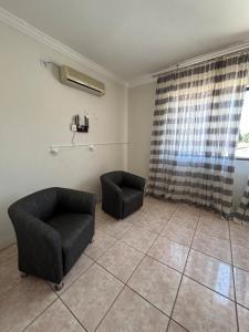 Posezení v ubytování Flats Itaipu - Apartmento perto da Itaipu