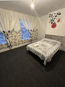 Ένα ή περισσότερα κρεβάτια σε δωμάτιο στο Serenity 5775