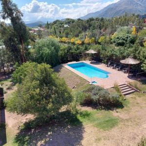an image of a swimming pool in a yard at Pa-kuas del Uritorco in Capilla del Monte