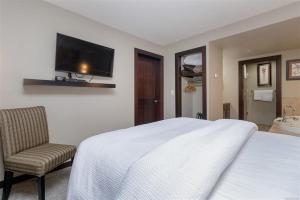 Postel nebo postele na pokoji v ubytování Stylish Family Condo at Beachfront Resort