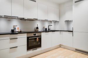 Køkken eller tekøkken på Modern apartment nearby Fjellheisen